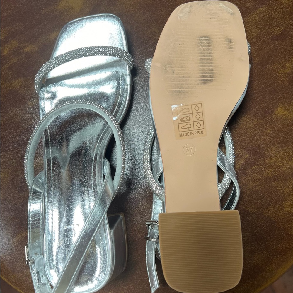 Silver strap sandals size 37 EUR or 6 1/2 US. PERFECT CONDITION